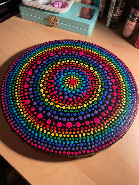 meditation on rainbows. Painting on round canvas by Michelle MaBelle